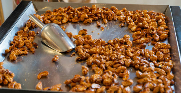 istock SELLING ALMONDS WITH CARAMEL IN A SHOP 1406567073