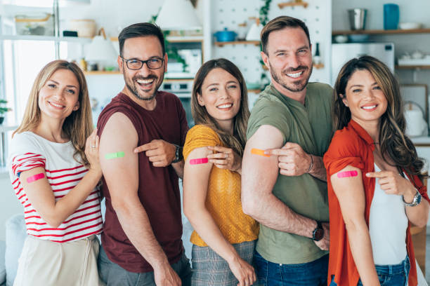 istock Friends showing their arms after getting vaccinated 1406568497