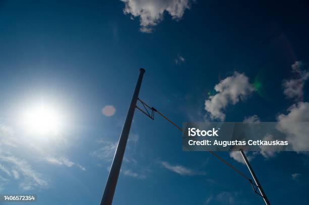 Pole Vault Against Blue Sky With Sun Horizontal Sport Theme Poster Greeting Cards Headers Website And App Stock Photo - Download Image Now
