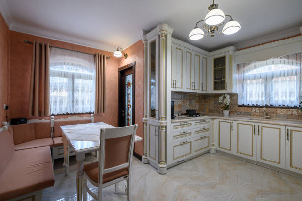 istock White classic cozy kitchen and dining room in city house 1406578681