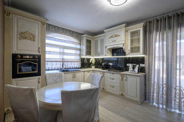 istock White classic cozy kitchen and dining room in city house 1406578764