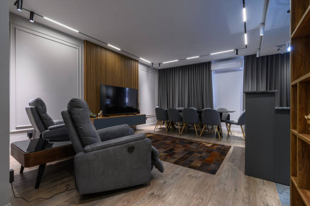 istock Luxury living room and kitchen in studio apartment 1406578835