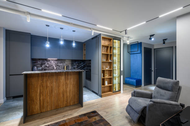 istock Luxury living room and kitchen in studio apartment 1406578839
