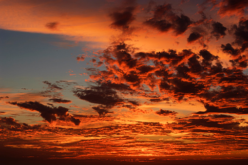 Vibrant sunset clouds over Pacific Ocean.\n\nTaken in Santa Cruz, California, USA.