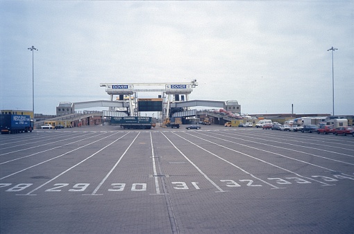 Dover, Kent, England, UK, 1988. Dover Ferry Port with trucks, cars and jetty.