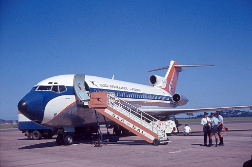 Durban, South Africa, 1974. Airliner On the airfield at Durban Airport. Also: ground staff.