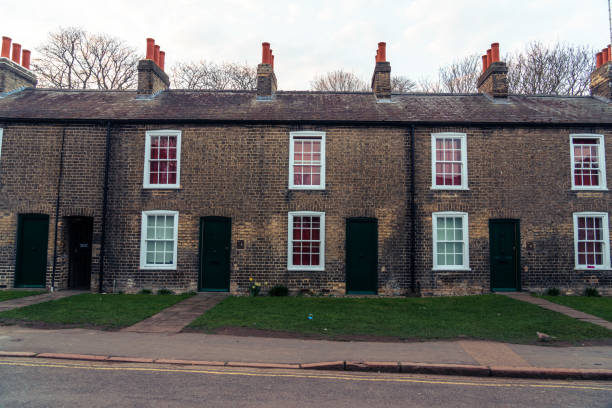 istock Row of red brick terraced houses 1406581606