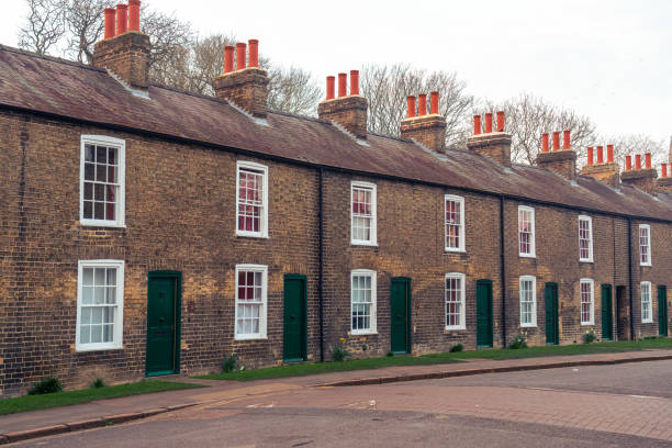 istock Row of red brick terraced houses 1406581624