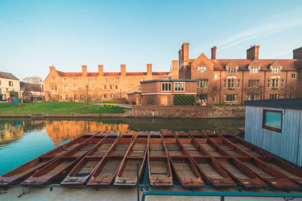 istock Canal river with boat in Cambridge 1406582573