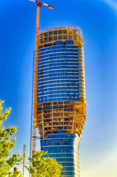 Belgrade tower under construction in Belgrade, Serbia. Belgrade, Serbia, September 11 2021: Belgrade tower under construction in Belgrade, Serbia. panoramic riverbank architecture construction site stock pictures, royalty-free photos & images