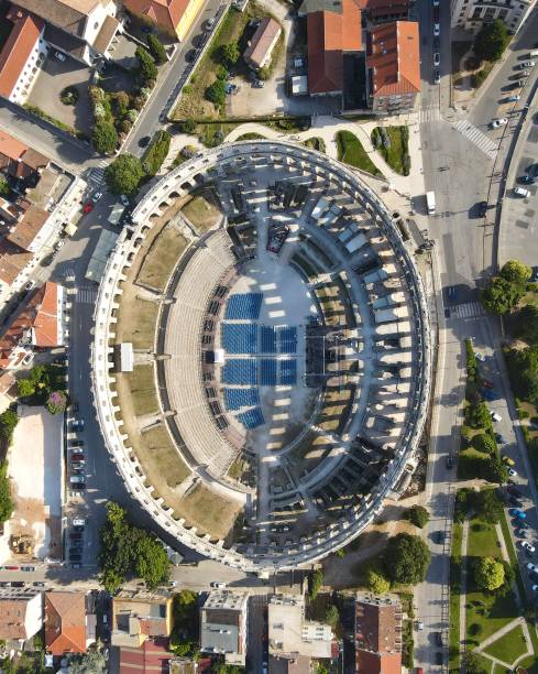 Drone shot of Pula Arena, amphitheatre, Croatia Drone shot of Pula Arena, amphitheatre, Croatia rovinj harbor stock pictures, royalty-free photos & images