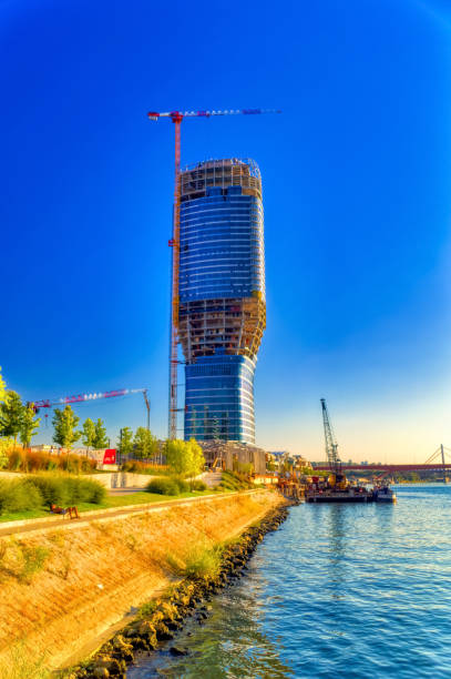 Belgrade tower under construction in Belgrade, Serbia. Belgrade, Serbia, September 11 2021: Belgrade tower under construction in Belgrade, Serbia. panoramic riverbank architecture construction site stock pictures, royalty-free photos & images