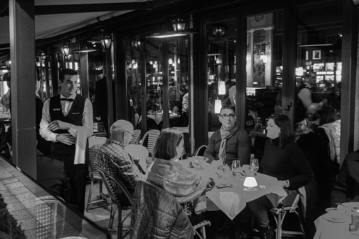 05-14-2016  Paris. People in  cafe on  Champs Elysees  street  in Paris.  good mood in one of the best places in the world