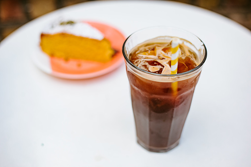 iced coffee in disposable plastic cup