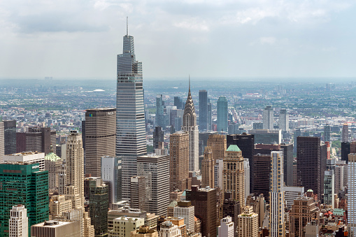 New York, USA. 09.21.2022. Beautiful aerial view of densely built-up skyscrapers of Manhattan and Hudson river.