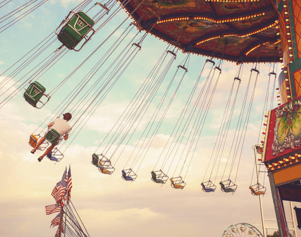 istock amazing fair scene with rides and entertainment 1406592021