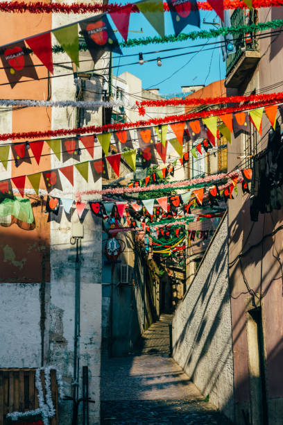 typical portuguese street party decorations in mouraria neighbhourhood during the saints popular parties - santos populares imagens e fotografias de stock