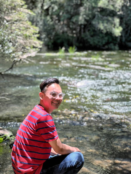 istock Man enjoying nature in the sunlight. 1406593429