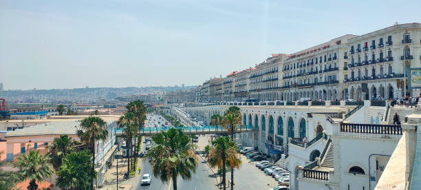 The port of Algiers (the fishery) Panoramic view of the port of Algiers (the fishery), and the colonial buildings facing the sea algiers stock pictures, royalty-free photos & images