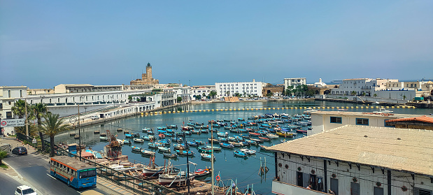 Panoramic view of the port of Algiers (the fishery), with its fishing boats and freight boats