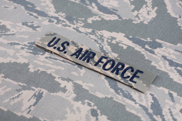 US AIR FORCE branch tape on digital tiger-stripe pattern Airman Battle Uniform (ABU) background