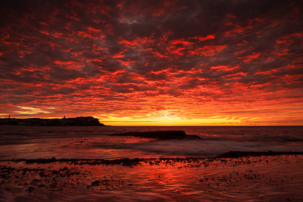 Bondi Beach at sunrise Bondi Beach at sunrise, Sydney Australia bondi beach sunrise stock pictures, royalty-free photos & images