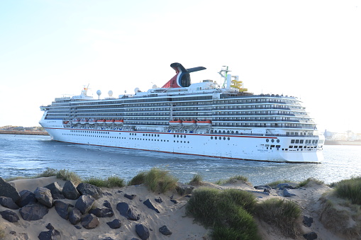 IJmuiden, the Netherlands - June 20th, 2022: Carnival Pride, operated by Carnival Cruise Line, arriving at Felison Terminal IJmuiden