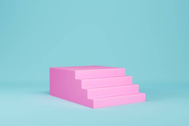 istock Pink stairs on light blue background for product display 1406604254
