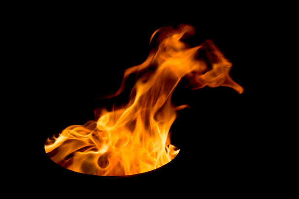 Burning flame from a solo stove during camping at night time