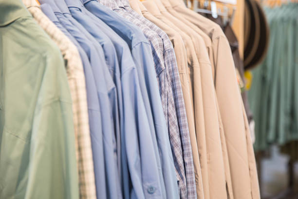 istock Different style of clothes displayed in a shop 1406612417