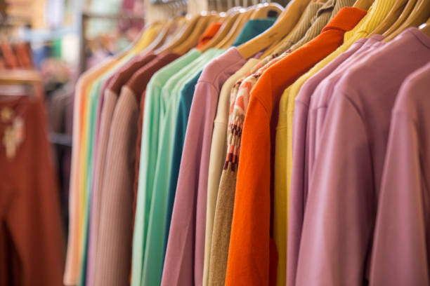 istock Different style of clothes displayed in a shop 1406612465