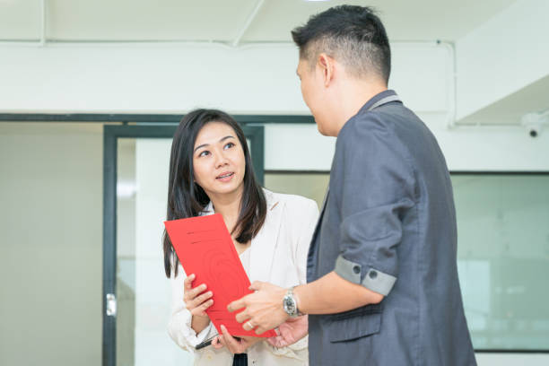 istock Business colleagues talking to one another. 1406613121
