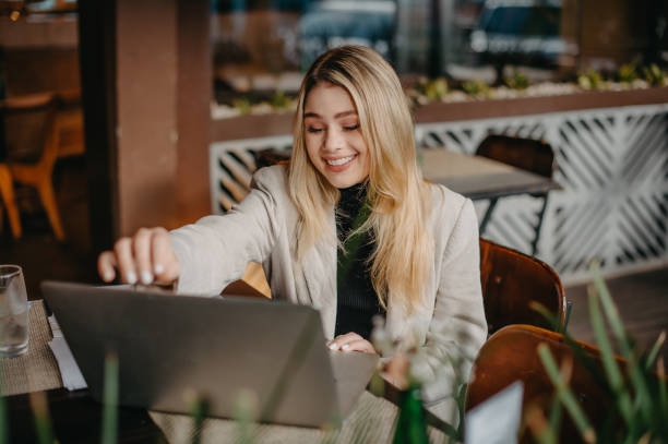 istock young woman working in a cafe 1406617420