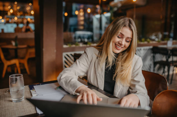 istock young woman working in a cafe 1406617443