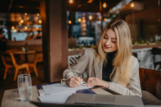 istock young woman working in a cafe 1406617444