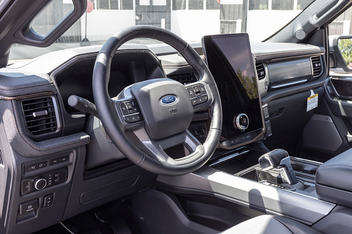 Tipton - Circa July 2022: Ford F-150 Lightning Infotainment display. Ford offers the F150 Lightning all-electric truck in Pro, XLT, Lariat, and Platinum models.