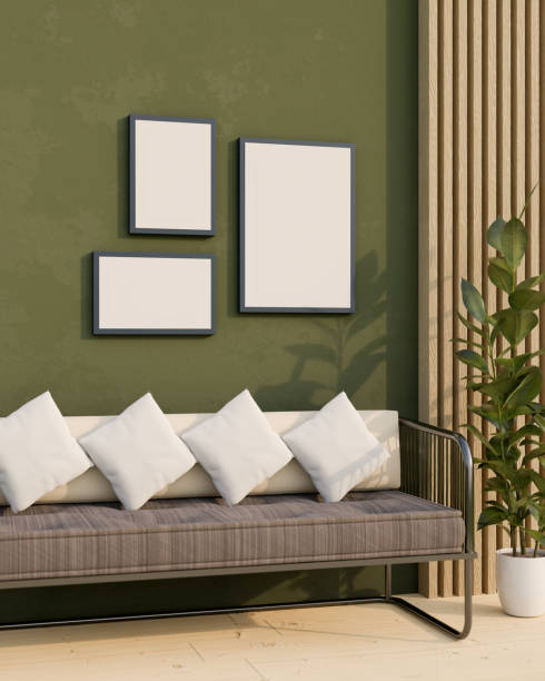istock Comfortable living room, relaxing area interior with comfy sofa, frame mockup on green wall. 1406627858