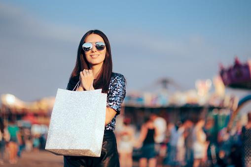 Carefree young person feeling trendy and cool at a shopping spree