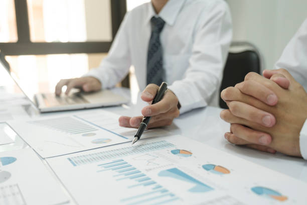 istock Businessman teamwork is thinking and analyse planing the strategy. 1406632886