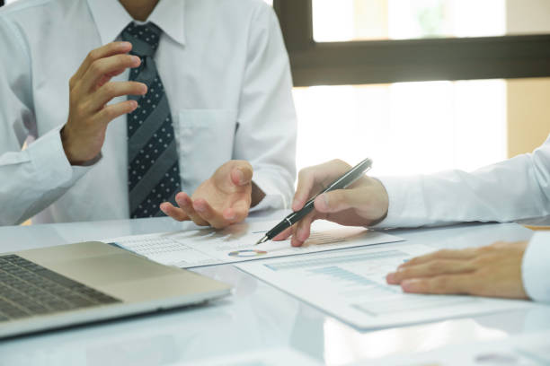 istock Businessman teamwork is thinking and analyse planing the strategy. 1406632892