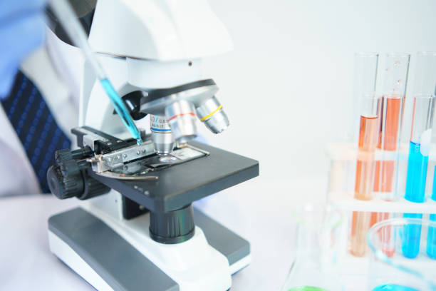 istock Asian scientists are seriously studying the chemical composition in the laboratory. Specializing in Young Biotechnology Use advanced microscope equipment. 1406634090