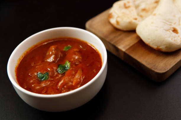 istock Indian chicken curry roux like tomato soup on the table 1406635162