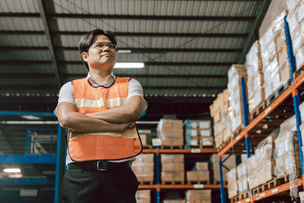 istock Warehouse staff portrait, asia. 1406635861