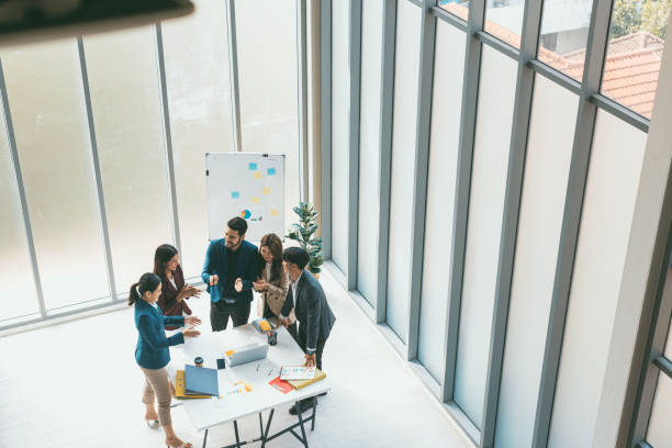 istock Business team brainstorm in office. 1406636042