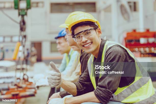 Heavy Industry Worker Workman Service Team Working In Metal Factory Portrait Happy Smiling Stock Photo - Download Image Now
