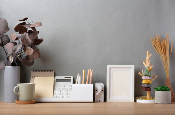 istock stationery stuff on working desk at home with photo frame 1406639254