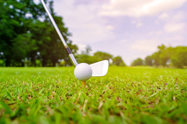 istock Golf ball on green grass ready to be struck on golf course 1406641757