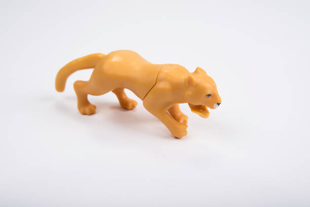 istock Lion, plastic toy from surprise chocolate kinder egg 1406643811