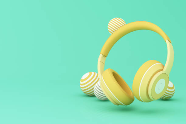 istock Realistic 3d render headphones with golden elements on green pastel background 1406649207