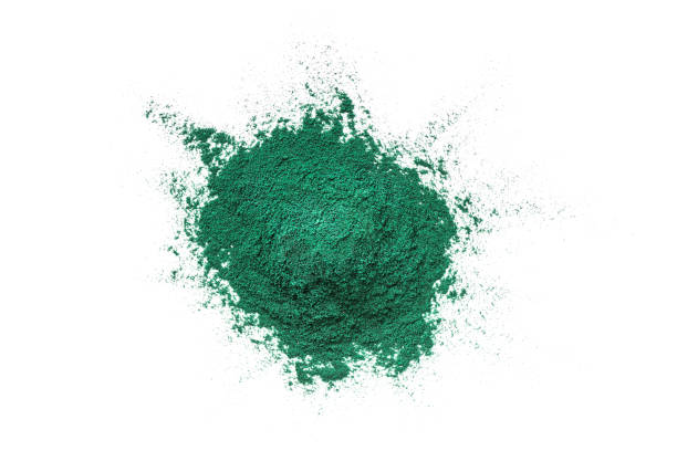 istock Heap of spirulina algae powder isolated on white background. 1406649242